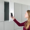 Open electronic lockers with a smartphone